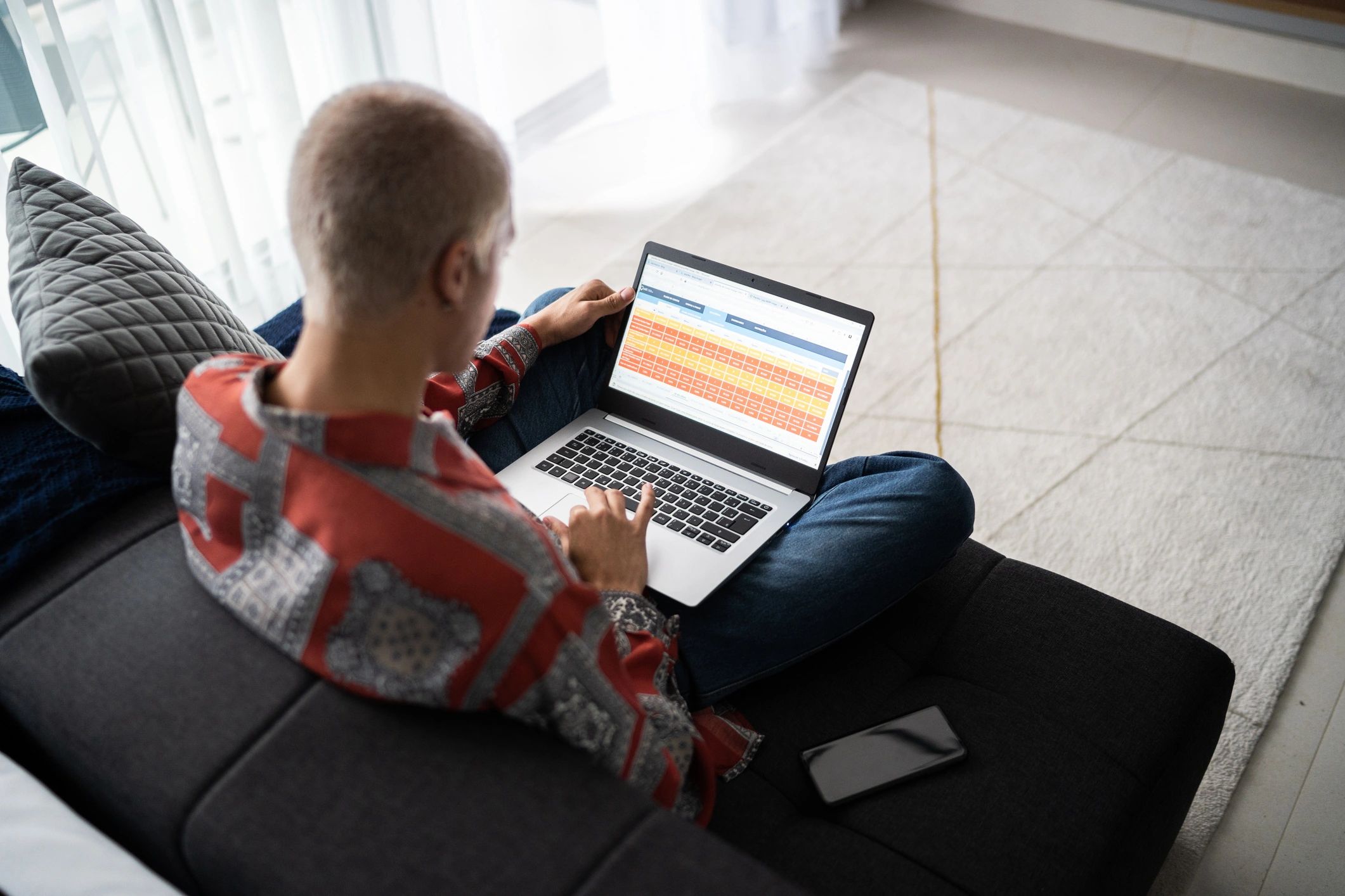 Patient using a laptop to access an online portal