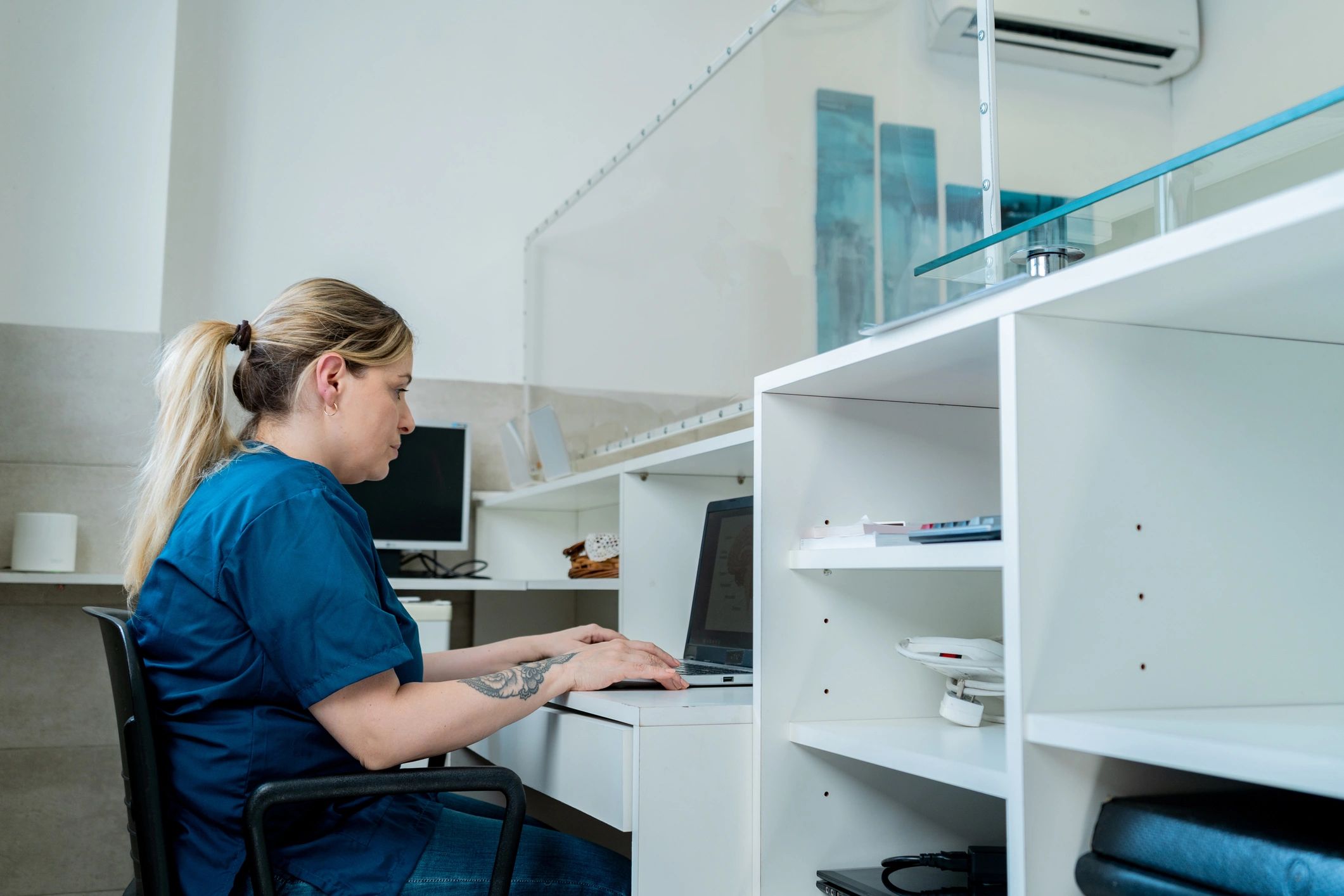 Hospital receptionist ready to assist