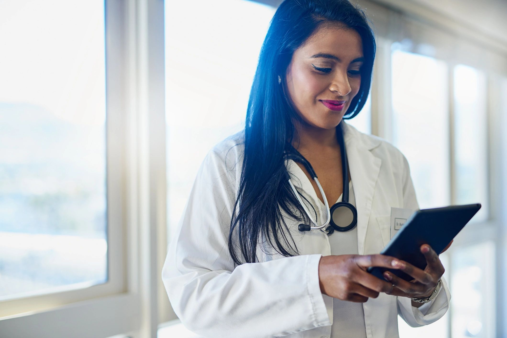 Doctor using a tablet in a hospital setting